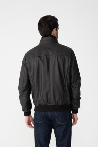 Bomber in pelle con collo di pelliccia