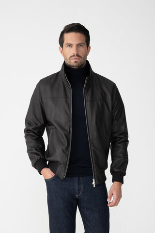 Bomber in pelle con collo di pelliccia