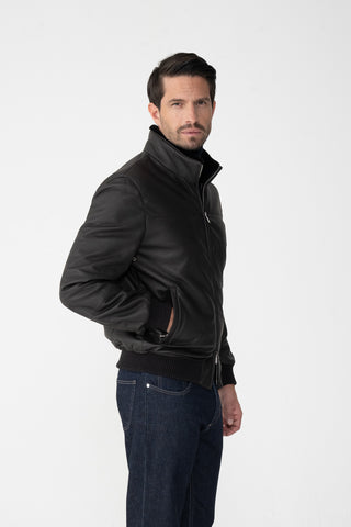 Bomber in pelle con collo di pelliccia