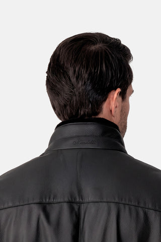 Bomber in pelle con collo di pelliccia