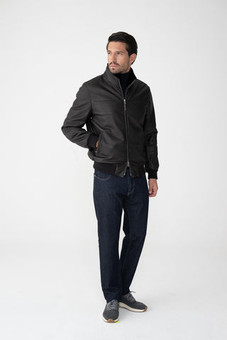 Bomber in pelle con collo di pelliccia